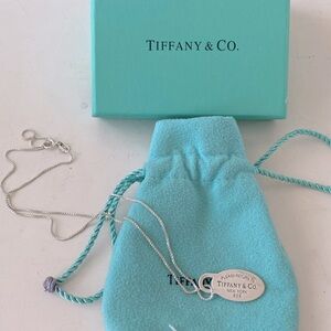 Tiffany & Co sterling silver “please return to Tiffany &Co new york pendant.
